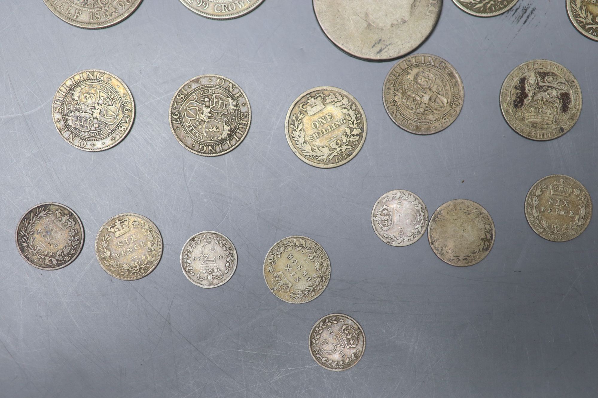 A collection of UK and world coins including George IV - George V silver threepences to halfcrowns